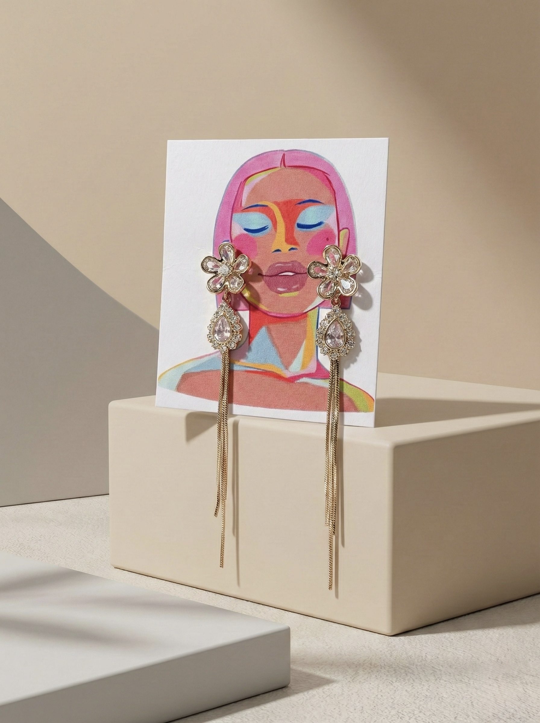 Elegant Gold-Toned Floral Drop Earrings with Teardrop Accents and Sleek Chain Tassels